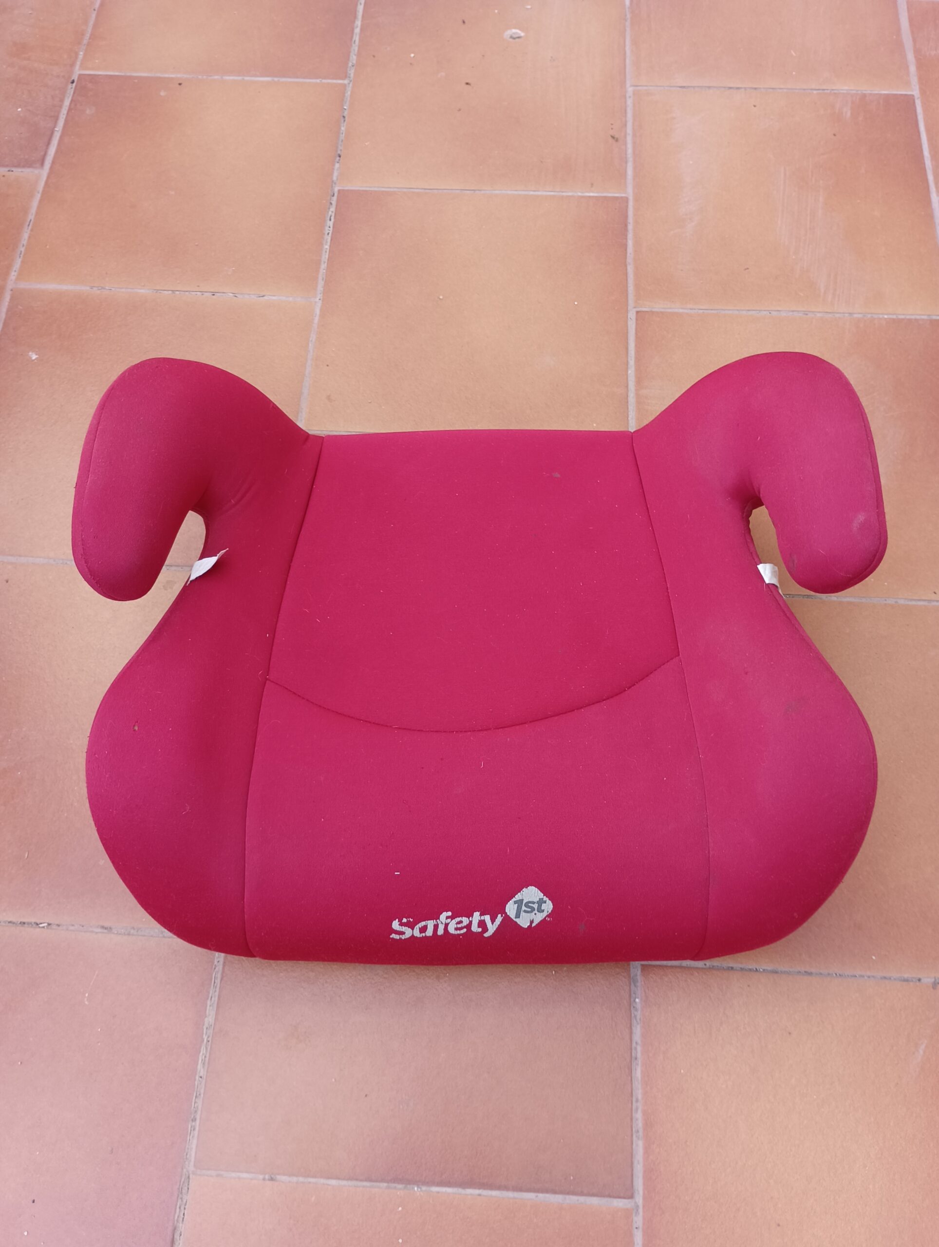 Alza de coche para niños.